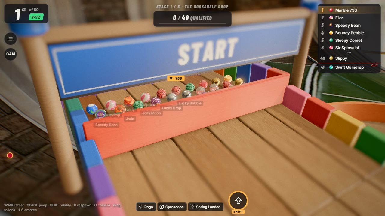 Fifty marbles lined up behind the start gate.